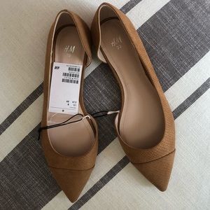 Brown snakeskin flats